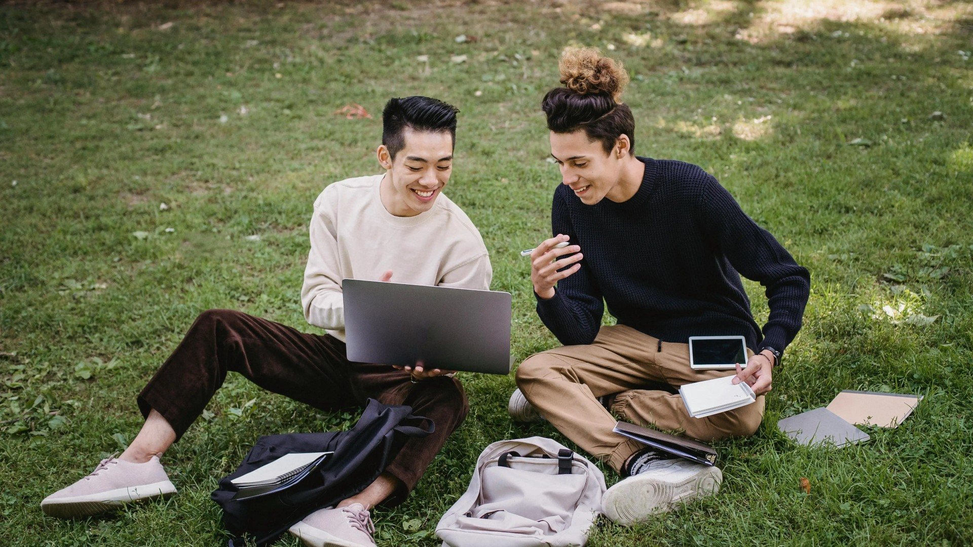 friends taking notes each other with a laptop